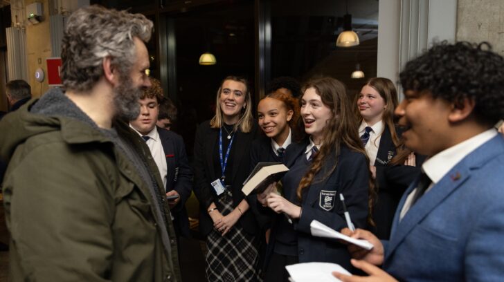 Students chat with Michael Sheen and laugh